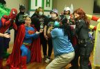 Patients surrounded by superheroes