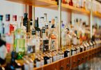 Liquor bottles behind a bar