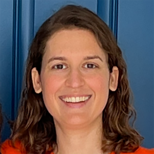 Woman with brown hair smiling