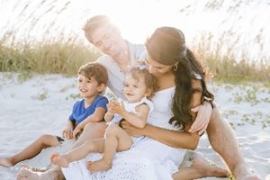 Family of four on a beach