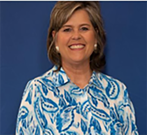 Woman in blue and white print shirt