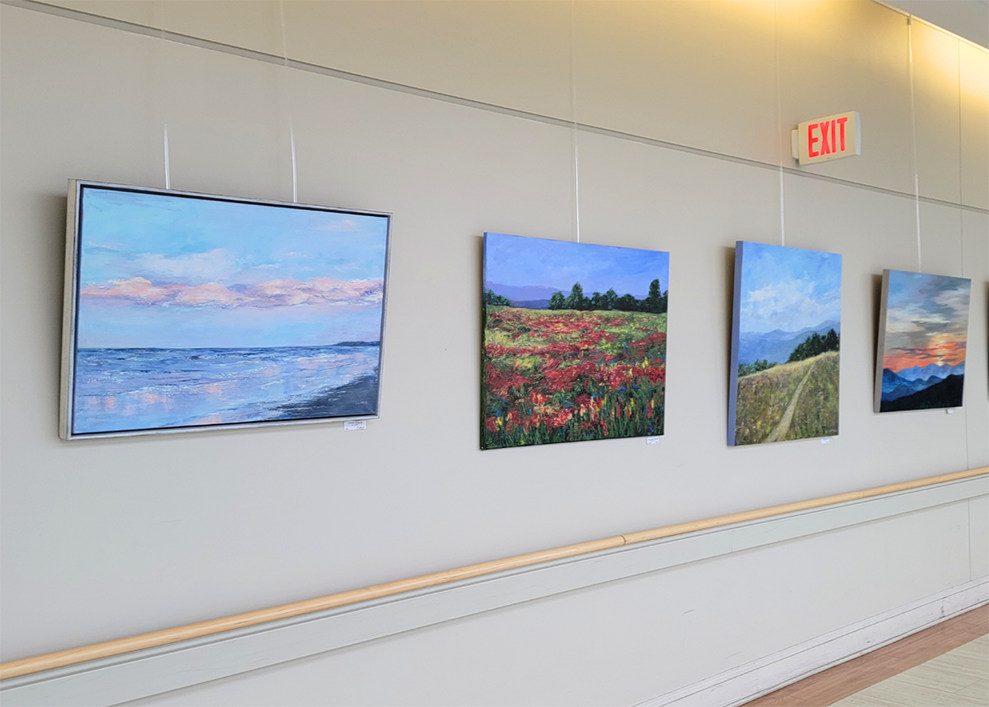 Paintings hanging on gallery wall