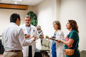 Honorees talk among each other at the Wellstar MCG Health all-star breakfast